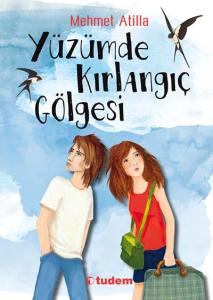 YÜZÜMDE KIRLANGIÇ GÖLGESİ